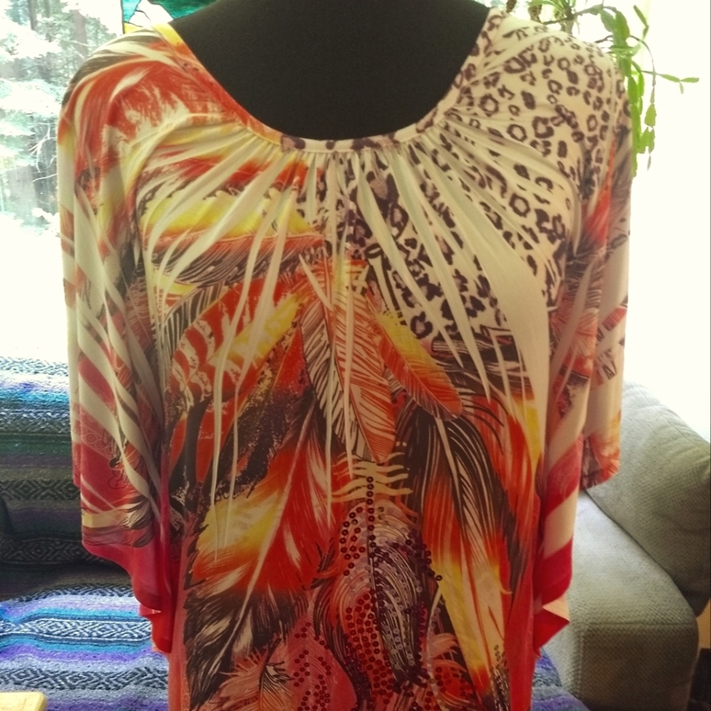 Large top with shoulders exposed butterfly sleeves